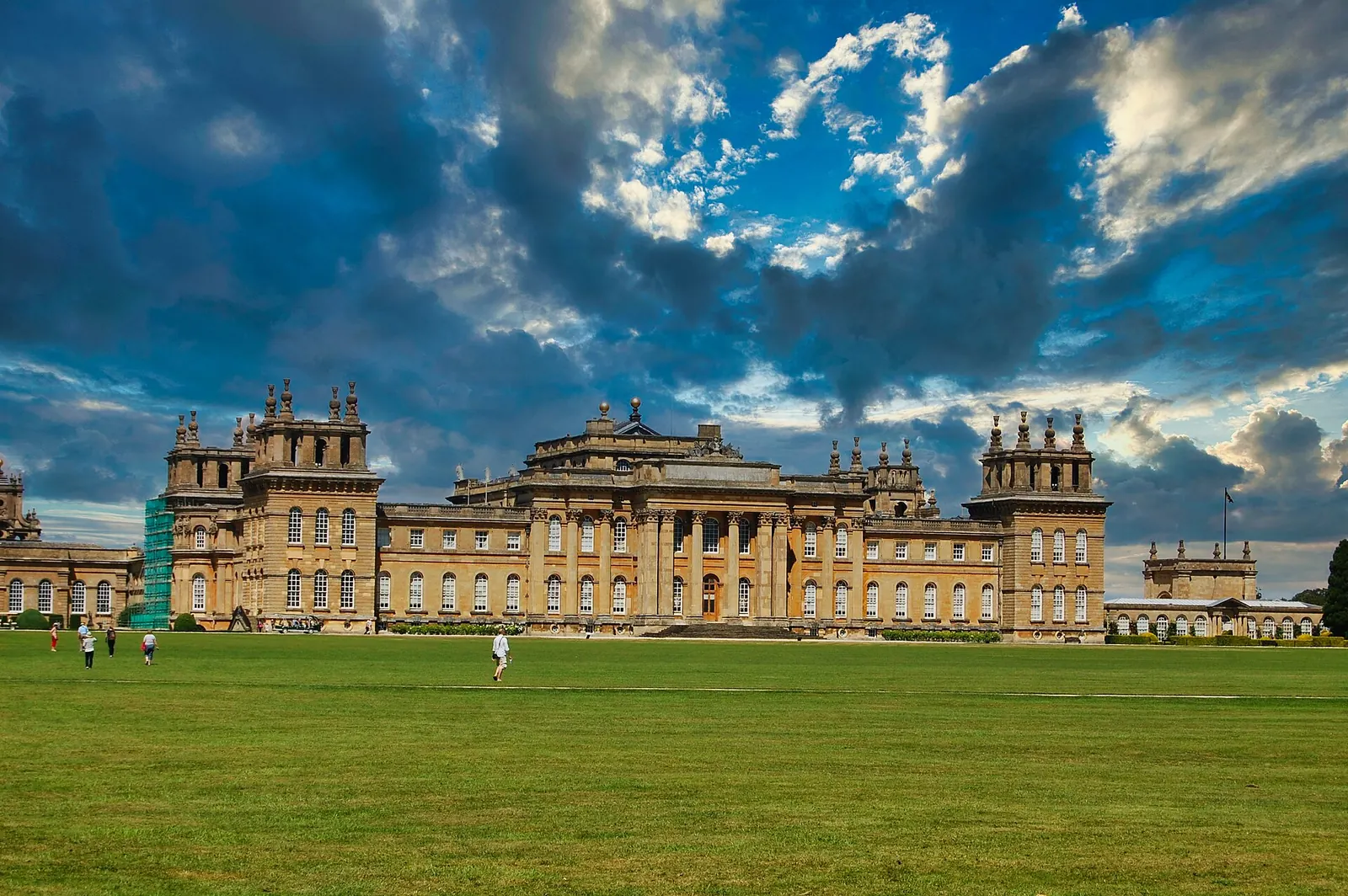 Blenheim Palace and its lawns under a dramatic sky