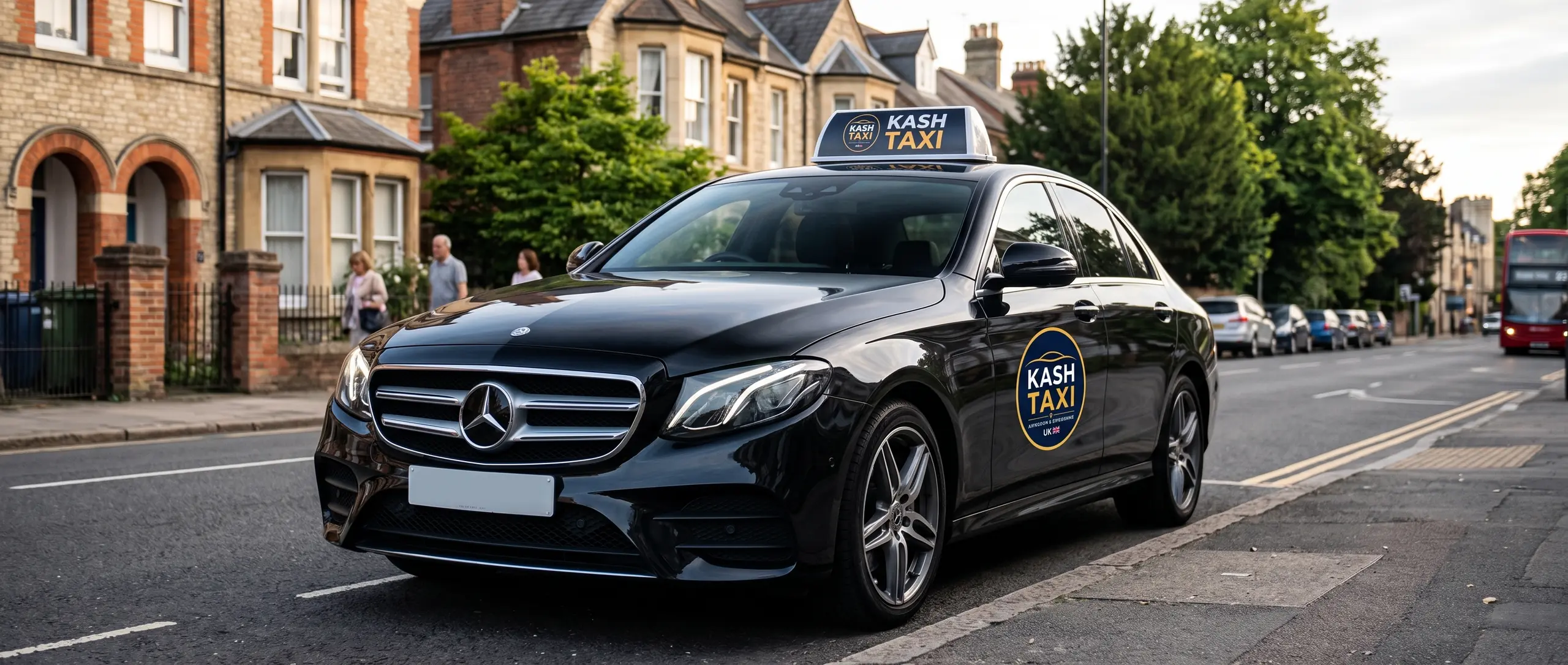 Kash Taxi Mercedes-Benz E-Class in Abingdon, with the Kash Taxi logo on the door and roof sign